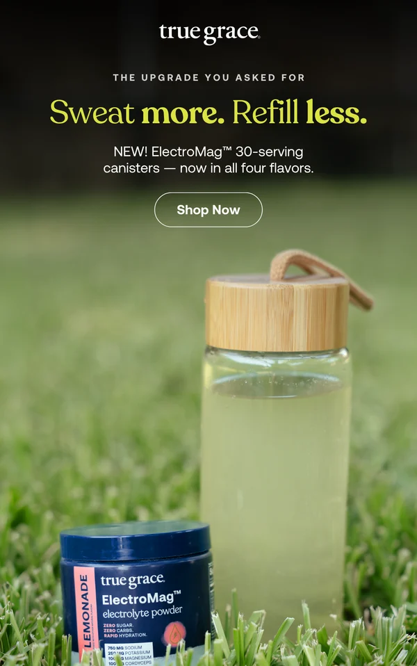 Top third of a True Grace campaign email: wordmark, eyebrow line, mixed weight headline, subcopy and a shop now button over a photograph of an electrolyte canister in grass